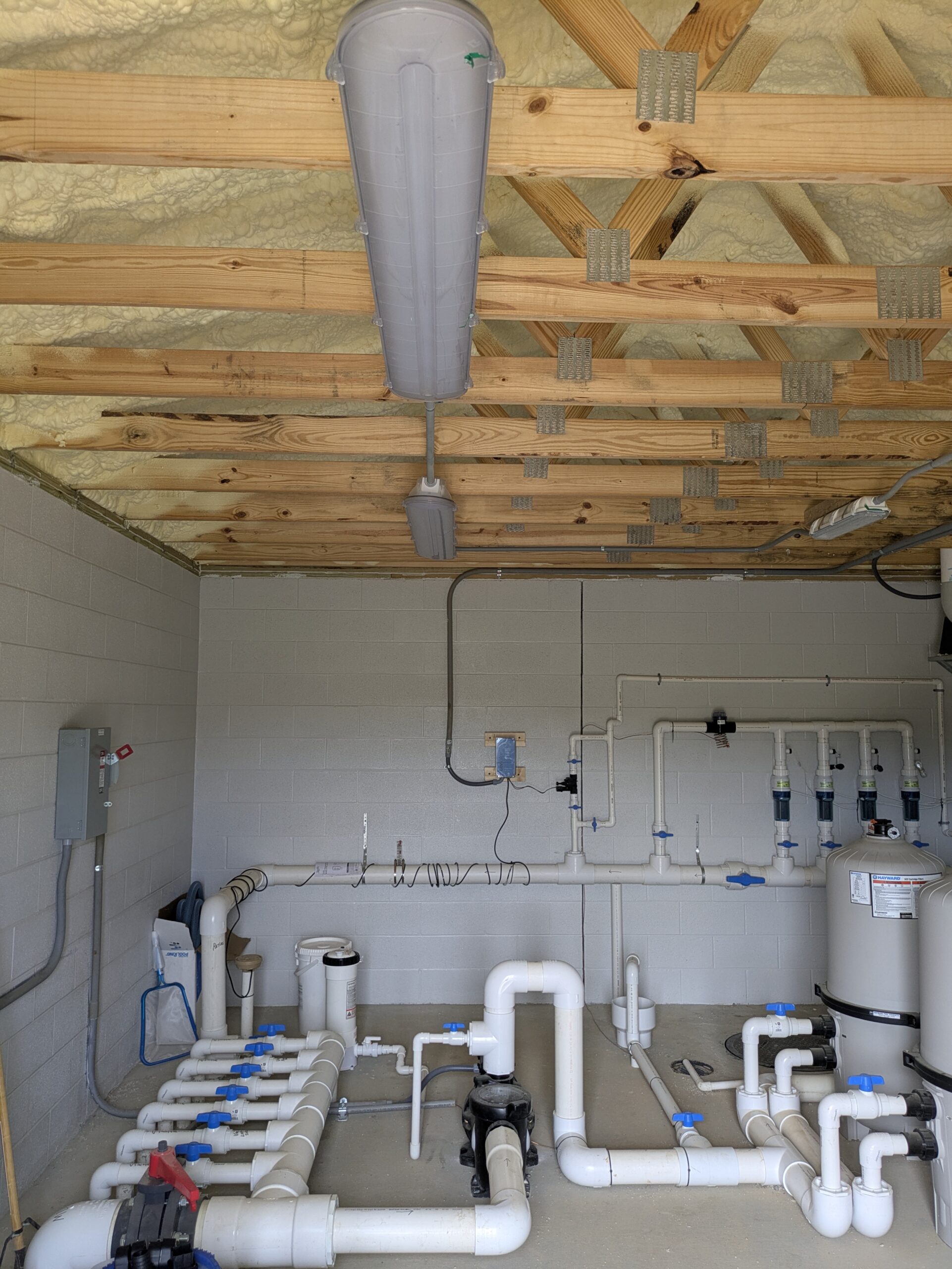 Newly built Ground-up pool equipment room interior