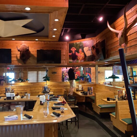 Interior restaurant remodel showcasing the bar of a texas roadhouse