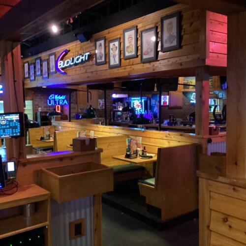 Photo of a texas roadhouse dining room showing off the new tin and skin refresh project