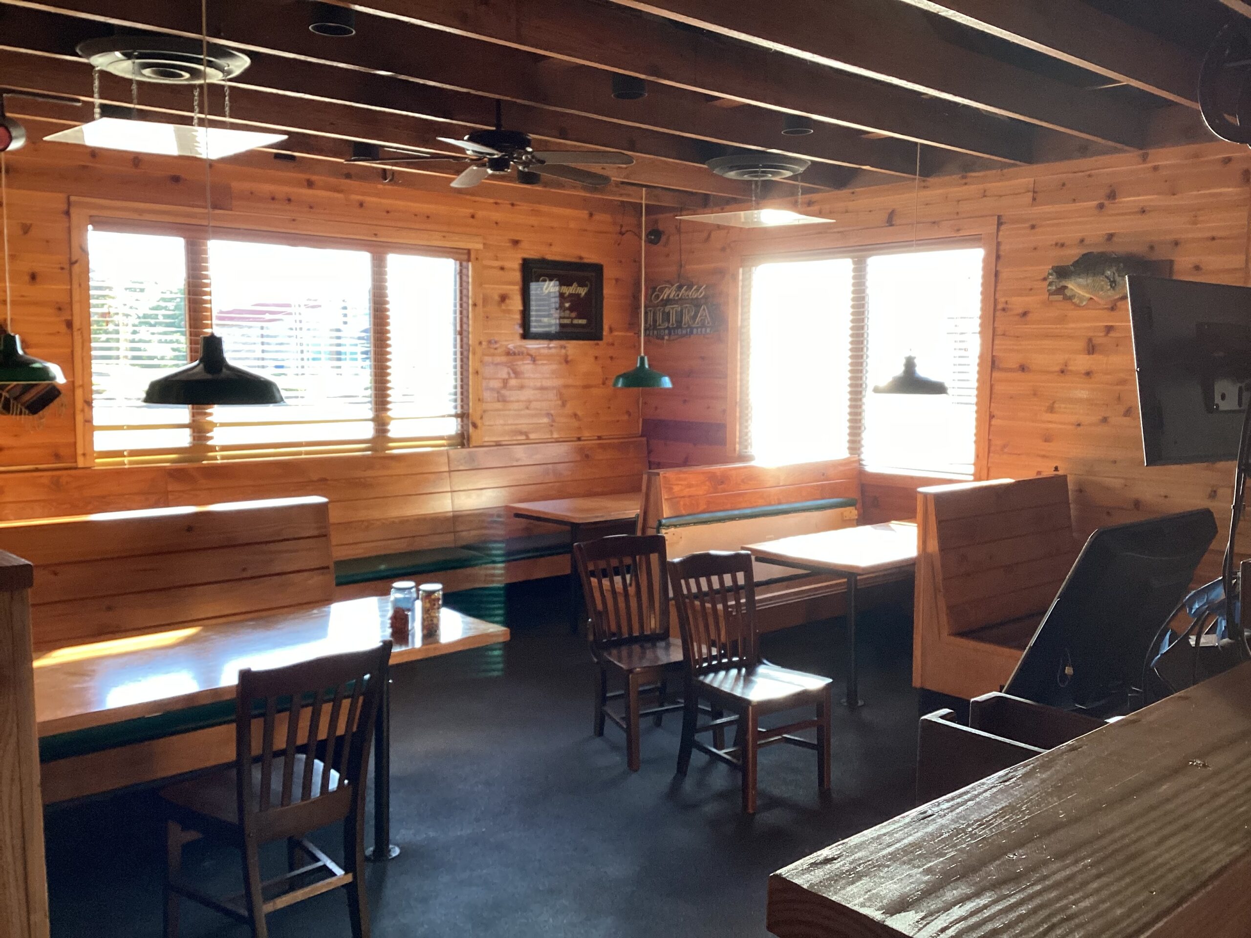 Interior tin & skin remodel in Hickory, NC featuring new booths, tongue-and-groove flooring, bar upgrades, ADA seating, and fresh finishes by VMC Facilities.