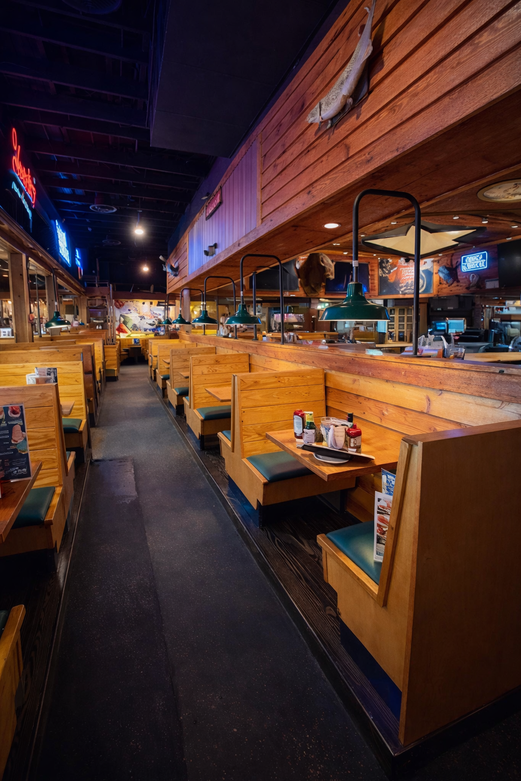 Texas Roadhouse Pelham, AL dining room conversion with reconfigured booths, new bar top installation, and updated seating layout.
