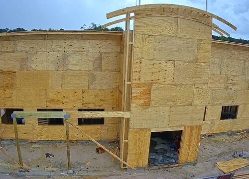 Exterior view of the new Bubba's 33 restaurant under construction in Beaumont, Texas with active site development and commercial building progress.