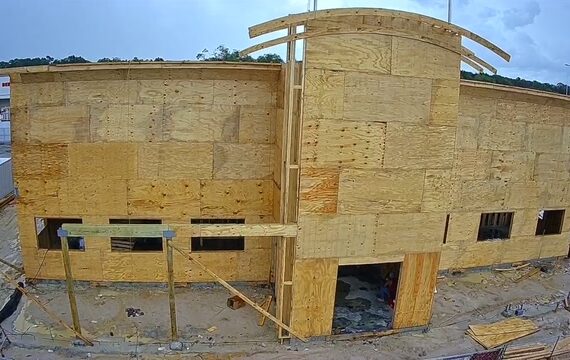 Exterior view of the new Bubba's 33 restaurant under construction in Beaumont, Texas with active site development and commercial building progress.